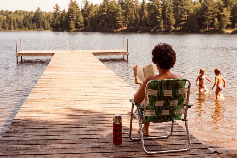 Mom in her chair at the end of the dock, 1979